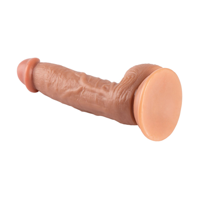 Un enorme dildo artificiale super spessa con un tappo di aspirazione e un tappo per il sedere.